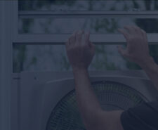 Man Installing a Window Fan