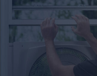 Man Installing a Window Fan