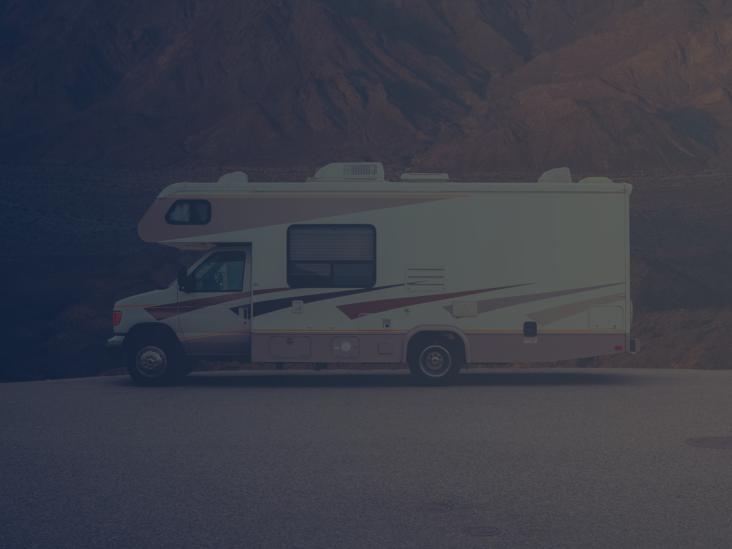 RV Camper with Roof AC in the Desert