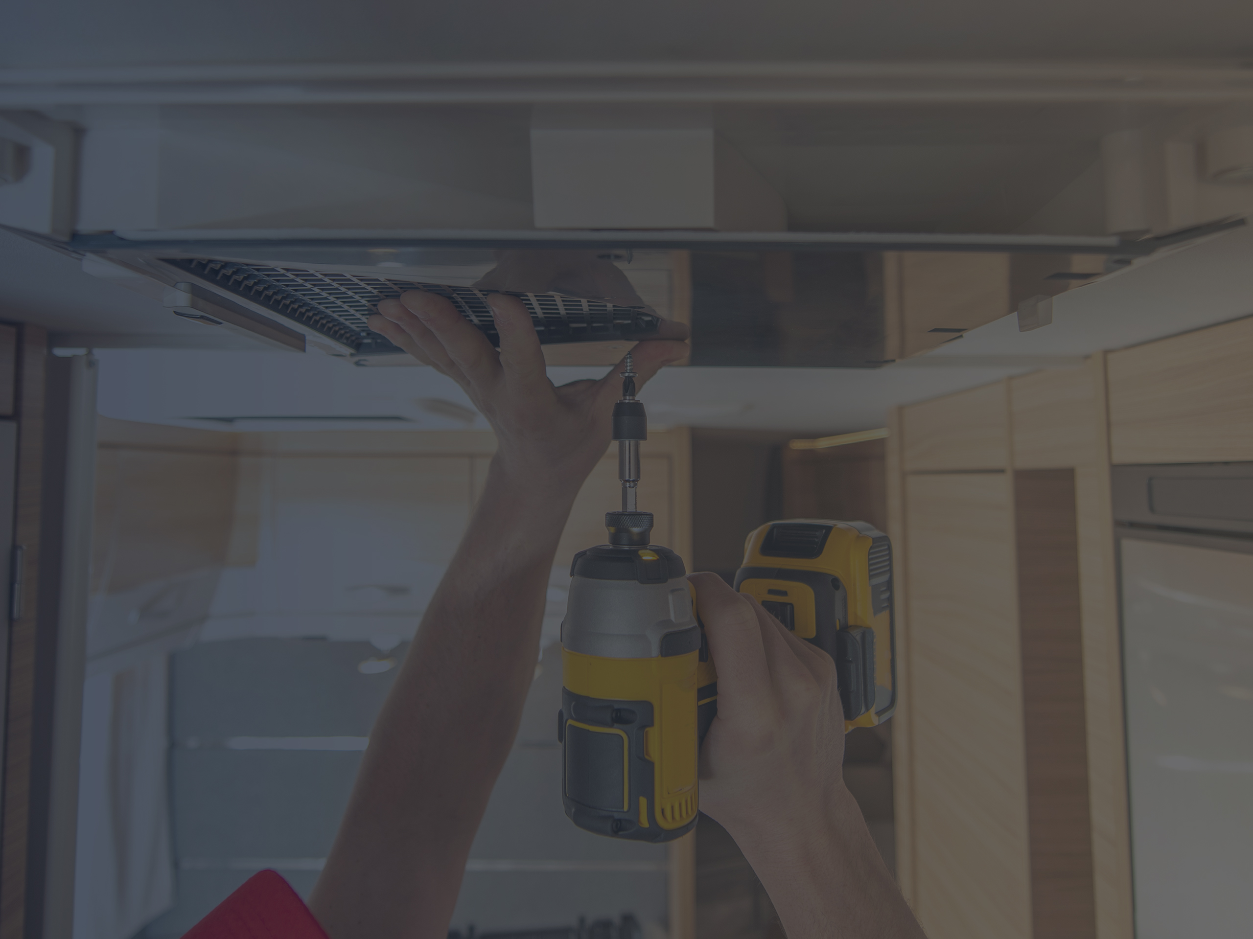 RV Technician Installing Air Conditioner