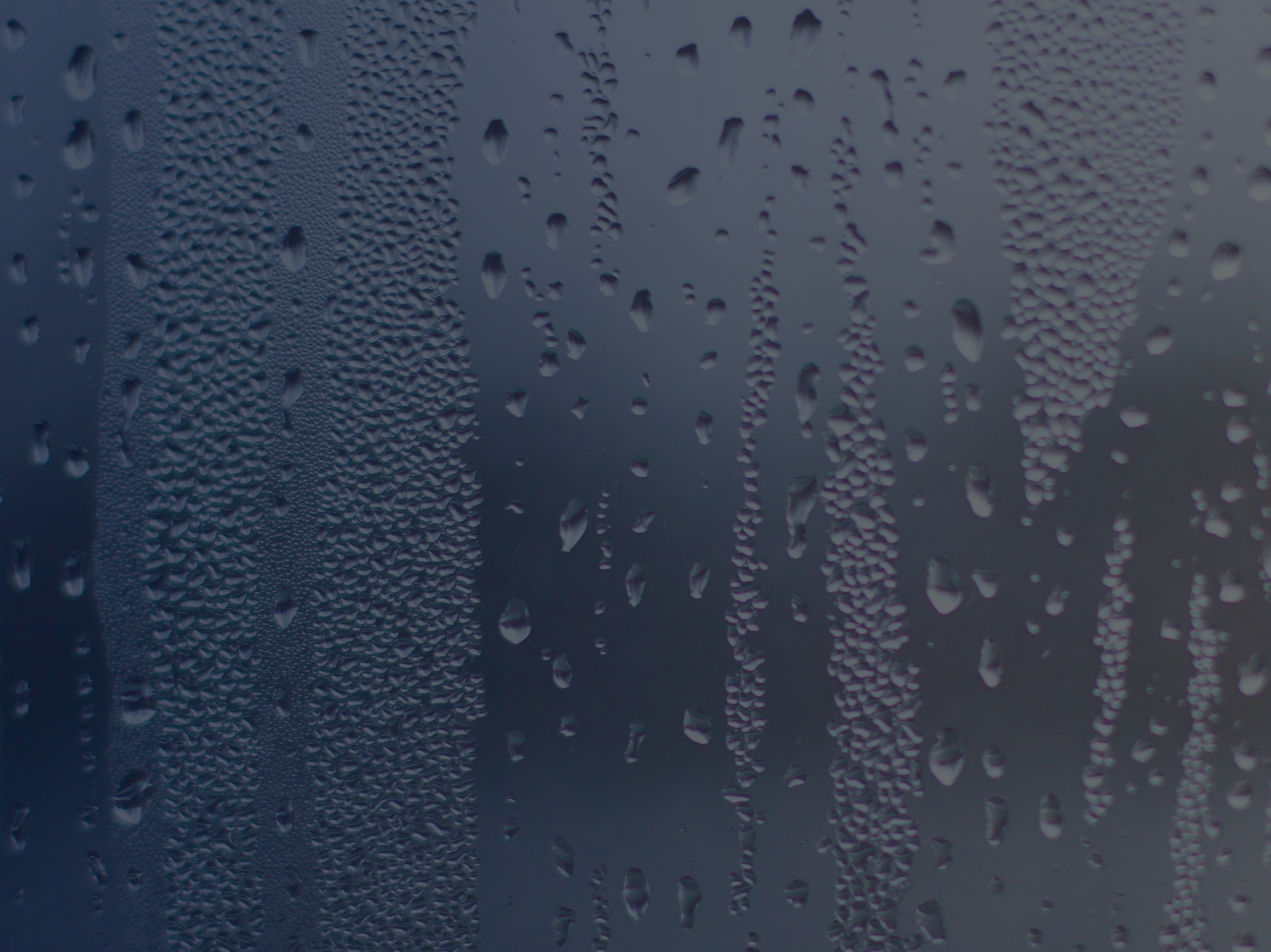 Water Drops on the Window Glass