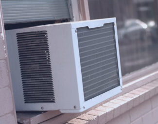 Window AC Unit Seen from Outside the Building